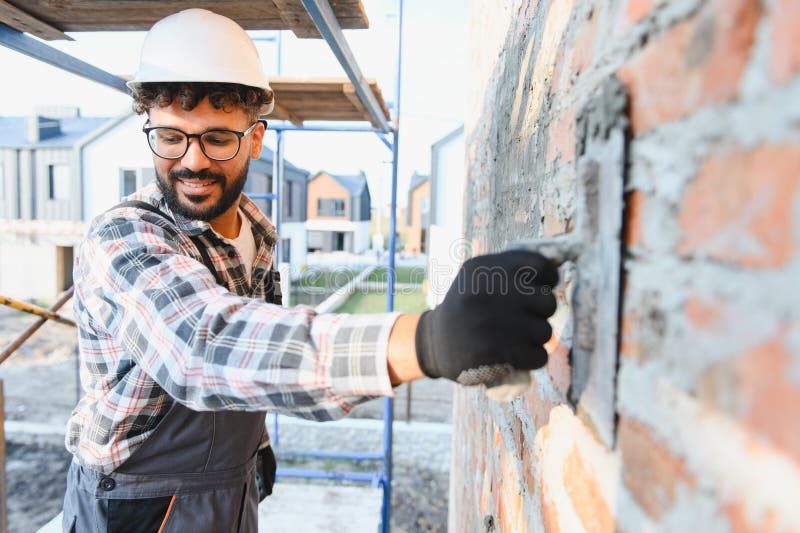 Stucco repair work on exterior wall